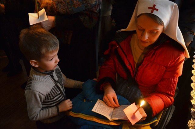 Ирина Сычева с сыном на великом покоянном каноне